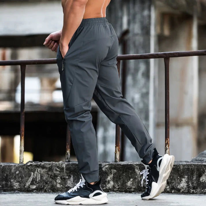 Homme | Pantalon de sport à coupe droite avec poches latérales